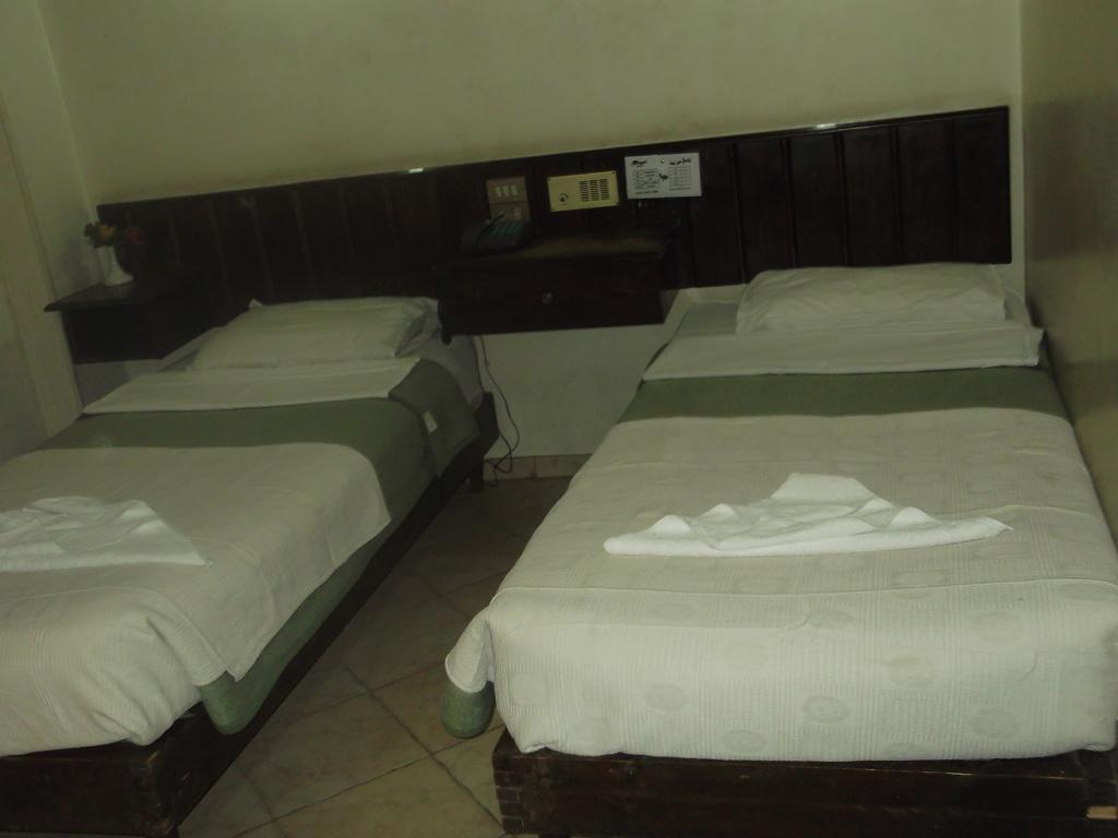 Sunset Hotel Luksor Quarto foto