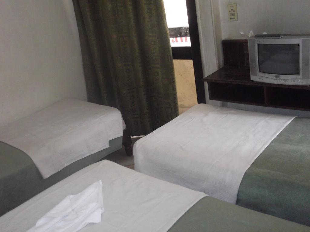 Sunset Hotel Luksor Quarto foto